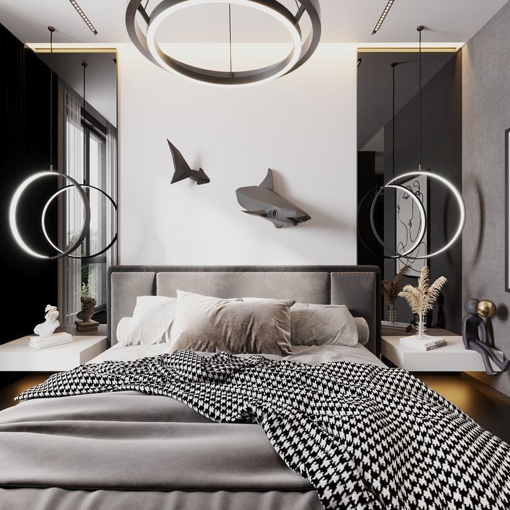 a bedroom with black and white bedding, round lights hanging from the ceiling and circular mirrors on the wall