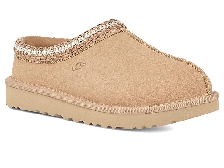 UGG Tasman - Women's Shoes : Driftwood : The Tasman always fits tight at first especially if someone has a high instep or high volume foot. It does stretch out over time. If you are in between sizes, please size up or down based on the volume of your foot and height of your instep. Take the suede UGG Tasman slip-on from weekday lounging to a Saturday excursion! Features a Tasman trim and a raw seam down the center with an embossed UGG logo at lateral side. Luxurious sheepskin lining for breathab Shoes To Ask For, Driftwood Tasman Uggs, Christmas Wishlist Shoes, Taxman’s Uggs, Ugh Tasman Slippers, Tazman Ugg, Light Brown Uggs, Ugh Tasman