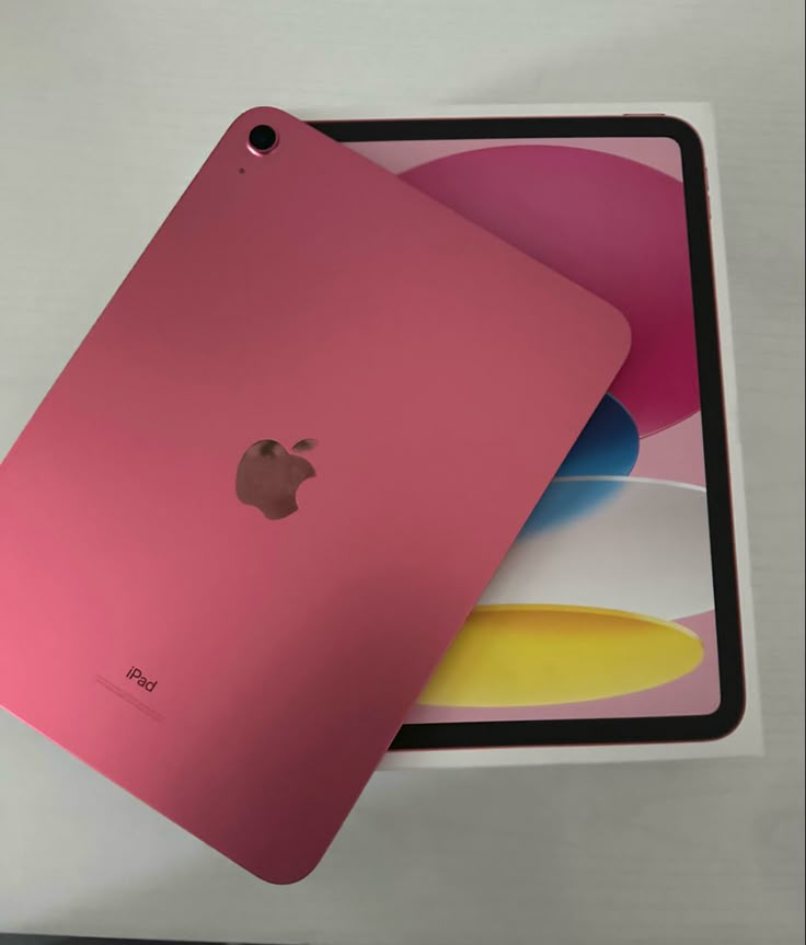 an apple ipad is sitting on top of the box