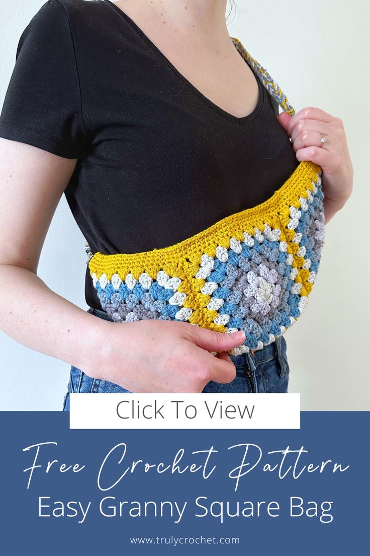 a woman holding a crochet granny granny square bag