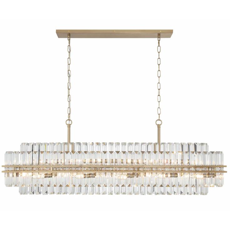 a large chandelier with clear glass beads hanging from the bottom and gold chain