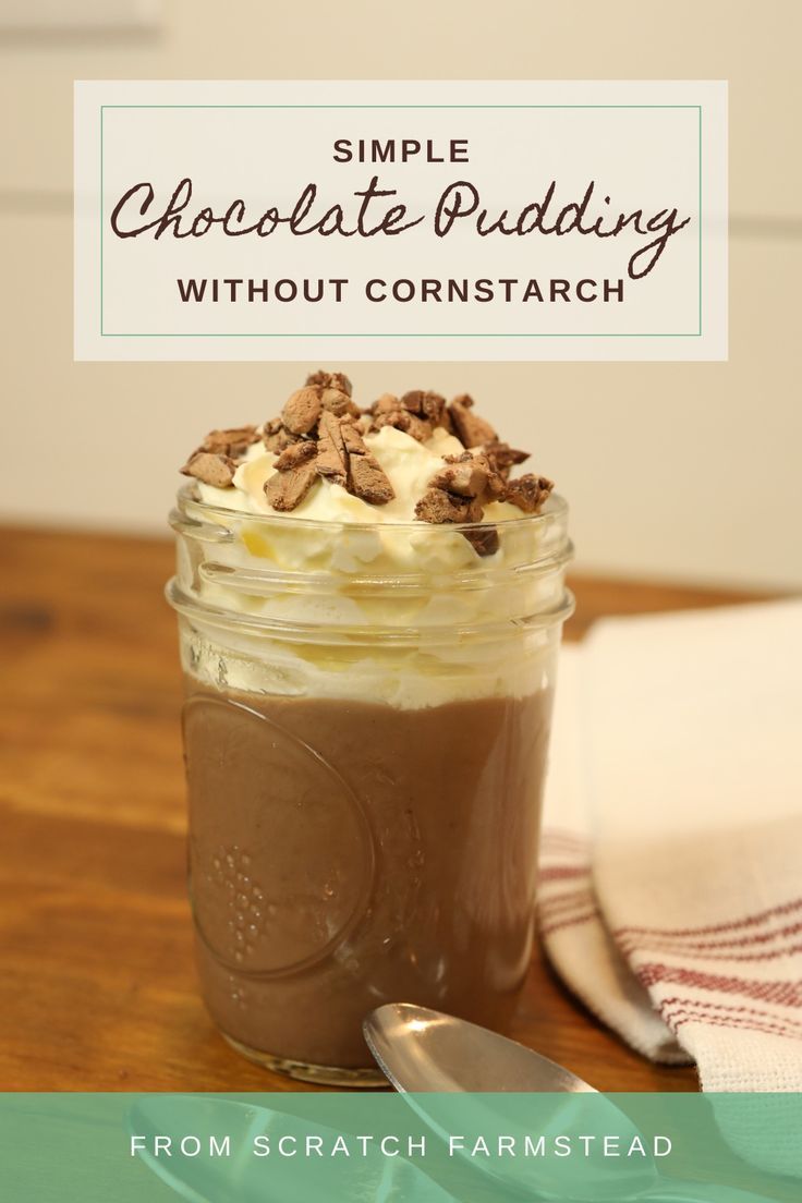 a mason jar filled with chocolate pudding and topped with whipped cream