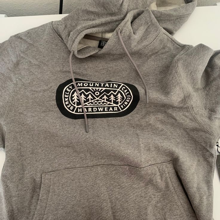 Band New With Tags Mountain Hard Wear Gray Cotton Hoodie With Graphic Print, Casual Sweatshirt For Outdoor Winter Activities, Casual Hooded Sweatshirt For Outdoor, Casual Winter Sweatshirt For Outdoor Activities, Casual Gray Sweatshirt For Outdoor, Outdoor Long Sleeve Cotton Hoodie, Cotton Hoodie For Outdoor, Cotton Long Sleeve Hoodie For Outdoor, Casual Outdoor Sweatshirt With Kangaroo Pocket