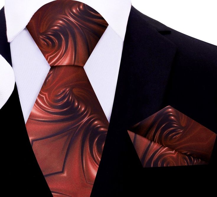 This is a must have for any tie enthusiast.This tie is a sweet treat for someone who loves unique ties or who loves chocolate! The Silky Smooth Chocolate Swirl is a Dark Chocolate and Milk Chocolate Brown Colorway that looks like melted swirls of fresh chocolate! Enjoy!Included: Single Tie Tie and Pocket Square Material of Tie and Square: 100% Silk.Dimensions of Pocket Square: 10.5” x 10.5” Inches.Length of Tie: Regular (60”) XL (63”) Width of Tie:3.4” Inches.Pattern On Fabric:Silky Smooth Choco Brown Bow Tie, Grey Bow Tie, Yellow Bow Tie, Purple Bow Tie, Polka Dot Bow Tie, White Bow Tie, Floral Bow Tie, Pink Bow Tie, Orange Bows