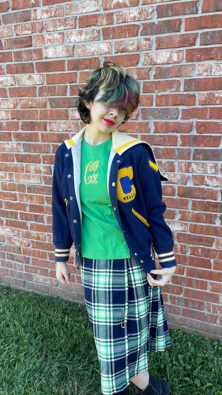 Step back in time with this stylish Vintage Varsity Jacket in vibrant blue and gold. Perfect for showcasing classic school spirit, this retro athletic bomber jacket captures the essence of 1980s sports culture. It's not just a piece of clothing, but a slice of history. - Timeless Style: Features the iconic letterman design with striped ribbing and a snap front closure. - Vibrant Colors: Stand out with the striking blue and gold colorway, perfect for any sporty or casual outfit. - Quality Materia Retro Long Sleeve Varsity Jacket For College, Retro Cotton Varsity Jacket For School, Blue Collegiate Track Jacket For College, Retro Blue Hooded Varsity Jacket, Blue Hooded Retro Varsity Jacket, Blue Retro Hooded Varsity Jacket, Retro Cotton Varsity Jacket For College, Retro Long Sleeve Varsity Jacket For Campus, Blue College Style Outerwear For School