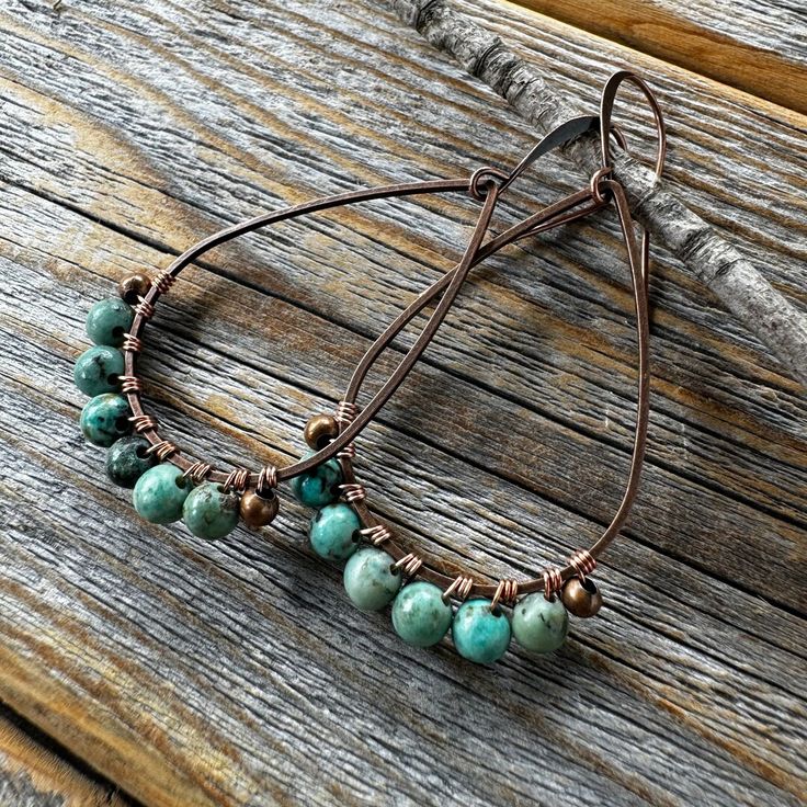 This Dangle & Drop Earrings item by TheBeadCounter has 43 favorites from Etsy shoppers. Ships from Atlantic Highlands, NJ. Listed on Jul 26, 2024 Original Jewelry Design, Natural Stone Earrings, Wrapped Earrings, African Turquoise, Jewelry Wire, Wire Wrapped Earrings, Boho Stil, Turquoise Earrings, Bohemian Jewelry