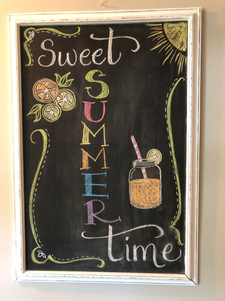 a chalkboard sign that says sweet summer time