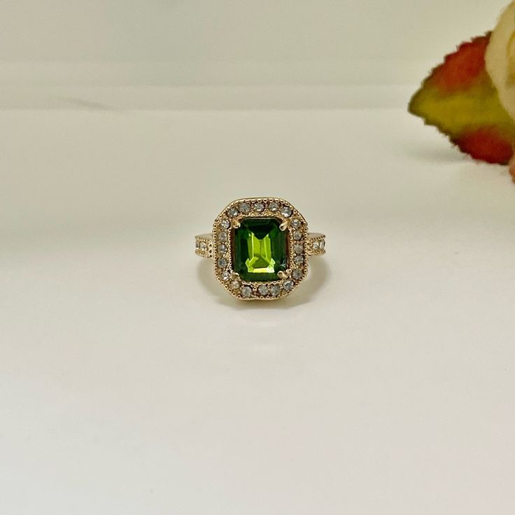 Color: Gold & Green Condition: 100% Brand New Material: Gold Plated Green Emerald Cut Halo Jewelry, Classic Green Jewelry With Vs Clarity, Green Halo Fine Jewelry, Formal Green Halo Jewelry, Green Halo Design Fine Jewelry, Green Halo Ring Jewelry, Green Halo Rings As A Gift, 14k Gold Green Halo Jewelry, Green Halo Rings For Gift