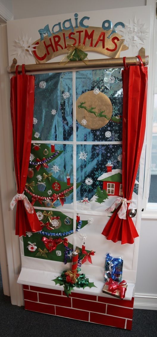 a window decorated with christmas decorations and presents