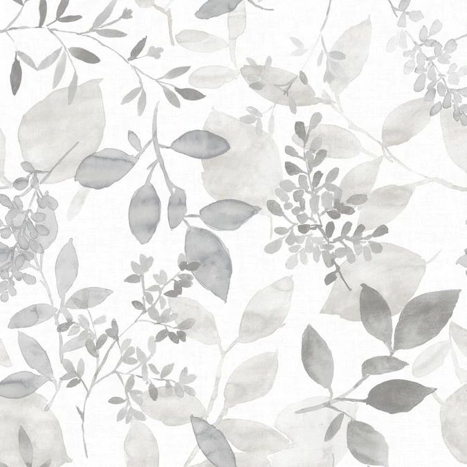 a white and grey floral wallpaper with leaves on the back drop in neutral tones