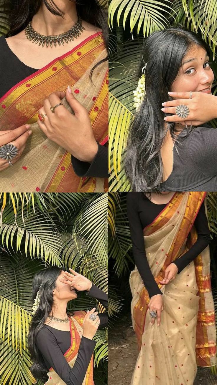 the woman is wearing a sari and holding her hands up to her face while standing in front of some palm trees