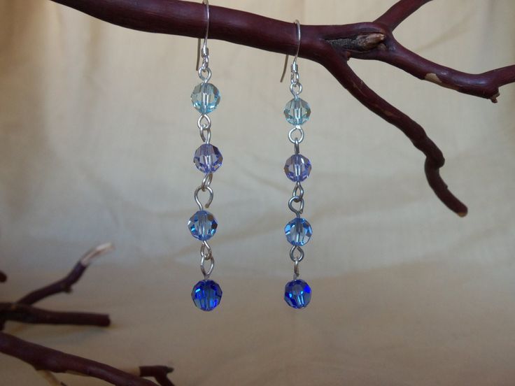 These beautiful, handmade earrings are a study in color. They feature Austrian Crystals, round and faceted, starting in a pale blue at the top and fading to a dark cobalt blue. They catch the light and sparkle as you wear them. Total length is 2.5 inches (7cm). Blue Faceted Round Earrings, Blue Round Faceted Earrings, Blue Faceted Dangle Earrings, Blue Round Earrings With Faceted Beads, Blue Faceted Beaded Crystal Earrings, Blue Crystal Earrings With Faceted Beads, Blue Crystal Earrings With Faceted Beads As Gift, Ombre Earrings, Beaded Necklace Diy