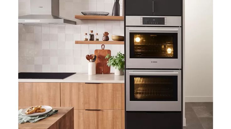 two ovens side by side in a kitchen