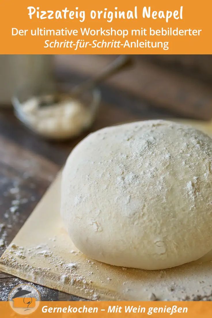 a ball of dough sitting on top of a piece of paper