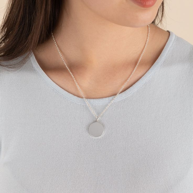 Wear this dainty Circle Charm Necklace with any OOTD, or gift to a loved one. Dainty Medallion Charm Necklace For Gift, Dainty Medallion Necklace Nickel Free, Dainty Nickel-free Medallion Necklace, Dainty Medallion Nickel-free Necklace, Simple Silver Necklaces For Mother's Day, Personalized Silver Minimalist Chain Necklace, Minimalist Medallion Necklace For Mother's Day, Classic Pendant Charm Necklace For Mother's Day, Minimalist Engraved Jewelry For Birthday Gift