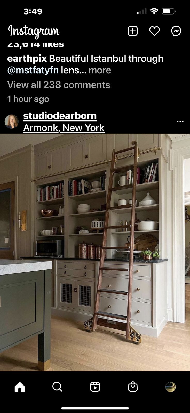 a ladder is in the middle of a kitchen