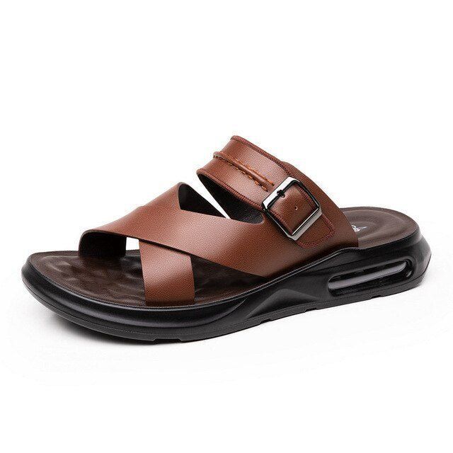 Introducing the high-end Men's Italian Sandals, Non-Slip. Crafted with fine genuine leather, these slip-on flats are great for casual days at the beach or more sophisticated days in the office. With comfort and functionality in mind, this timeless design has carefully treaded non-slip soles that will ensure a sturdy and safe stroll through any terrain. Another impressive detail is the vintage Italian craftsmanship that allows for modern flair while helping keep your feet cool throughout summer. The lightweight style of this shoe complements its stunning aesthetic and adds an effortless yet stylish touch to any outfit you choose. Experience everyday luxury with the Men's Italian Sandals, Non-Slip -- get yours today!

 If you want more products like this one, check out our  Men's Shoes page! Italian Sandals, Everyday Luxuries, Vintage Italian, Timeless Design, Men's Shoes, Genuine Leather, Slip On, Sandals, Leather