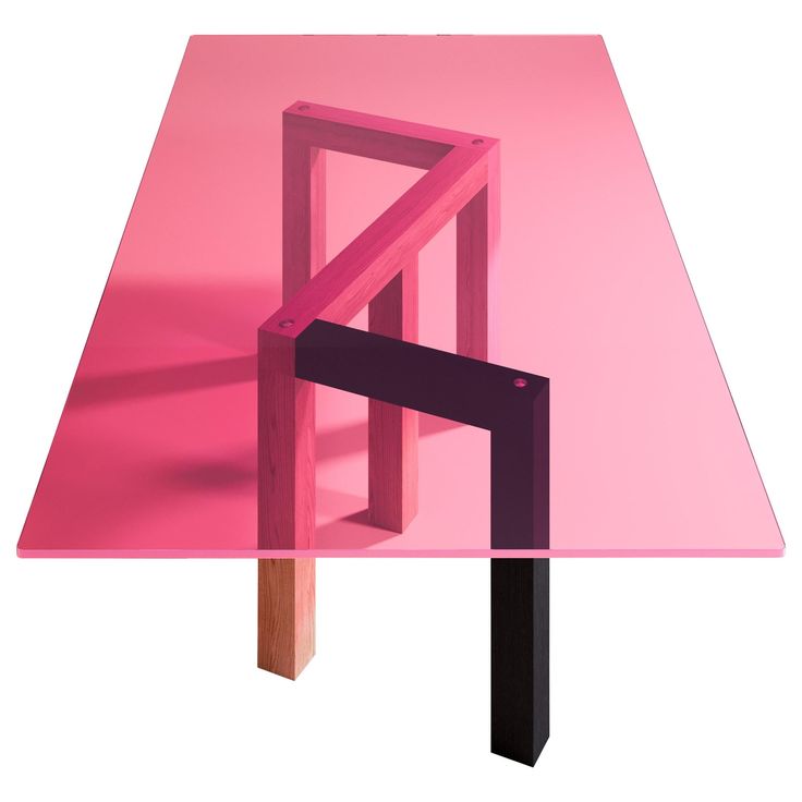 a pink table with black legs and a wooden structure in the shape of a chair