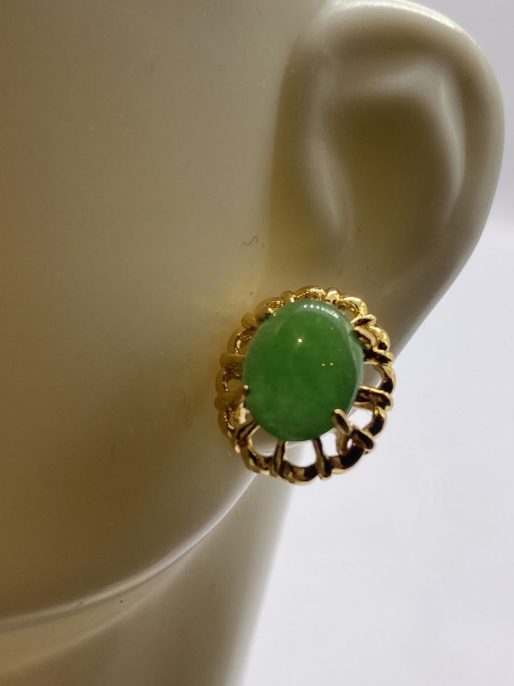 "These are lovely Green Jade Stud Earrings  Approximately 1/2 inch See our full collection of Vintage Jade: https://www.etsy.com/shop/EastVillageBangles?section_id=38654118 Jade, a birthstone of August, is often the gemstone associated with the twelfth wedding anniversary.  Jade comes in Nephrite and Jadeite varieties, each a crystallized form of silica. Jade draws its name from the Latin ilia, meaning 'flanks, kidney area' giving rise to the informal \"loinstone\".  Jade is known as a symbol of good luck, longevity, and wisdom promoting self acceptance and love. Jade brings a restoring energy balancing Heart chakra.   Jade is a relatively hard stone rating 6.5 on the Mohs scale.  Jade can be cleaned with mild soap in warm water, and a soft toothbrush or cloth.  Avoid harsh cleansers, blea Vintage Jade Round Earrings, Classic Green Clip-on Earrings As Gift, Fancy Blouse, Soft Toothbrush, Fancy Blouses, Fancy Blouse Designs, Jade Jewelry, Embroidered Jeans, August Birth Stone