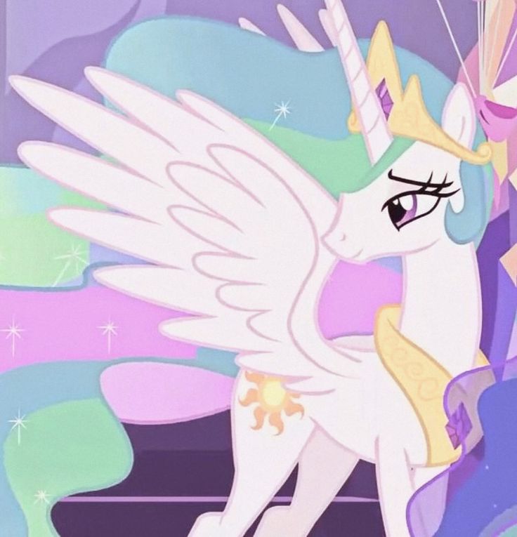 a little pony that is standing up with its wings spread out and looking at the camera