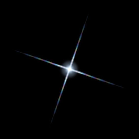 an image of a cross in the dark sky with light coming from it's center