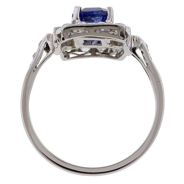 Centering a Cushion cut sapphire weighing 1.76ct., framed by four Baguette cut diamonds weighing approx. 0.47ctw, and numerous Old European cut diamonds weighing approx. 0.58ctw, fashioned in platinum. Size 7 1/2. Art Deco Platinum Sapphire Ring With Baguette Cut, Art Deco Platinum Baguette Cut Sapphire Ring, Platinum Sapphire Ring With Baguette Cut, Sapphire Baguette Cut Platinum Ring, Baguette Cut Sapphire Platinum Ring, White Gold Baguette-cut Sapphire Ring In Platinum, Classic Platinum Sapphire Ring With Radiant Cut, Baguette Cut Sapphire Ring In Platinum, Art Deco Sapphire Ring With Baguette And Brilliant Cut