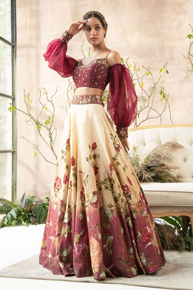 Maroon-cream lehenga with floral print and embroidered waistband. Comes with cold-shoulder blouse.
Component: 2
Printed, Embroidered
Neckline: Sweetheart
Sleeve Length: Full
Fabric: Dola Silk; Sleeves: Organza
Color: Maroon
Embroidered blouse
Organza cuffed sleeves - Aza Fashions Lehenga And Blouse, Printed Lehenga, Trendy Outfits Indian, Floral Lehenga, Lehenga Designs Simple, Lehenga Blouse Designs, Gaun Fashion, Indian Dresses Traditional, Lehenga Blouse