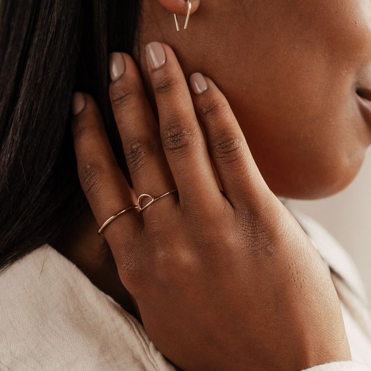 The Jude Ring is dainty and plain like our Jane ring, but a little thicker. A simple, minimalist band, the Jude Ring is designed to be worn as a timeless layering piece. 14k Gold Filled Dainty Everyday Rings, Dainty 14k Gold Filled Rings For Everyday, Everyday Simple 14k Gold Filled Stackable Rings, Everyday Simple Stackable Rings In 14k Gold Filled, Everyday 14k Gold Filled Midi Rings With Simple Design, Dainty 14k Gold Midi Rings For Everyday, Simple Stackable Initial Ring For Everyday, Classic 14k Gold Filled Midi Promise Rings, Rose Gold 14k Gold Filled Midi Rings For Everyday