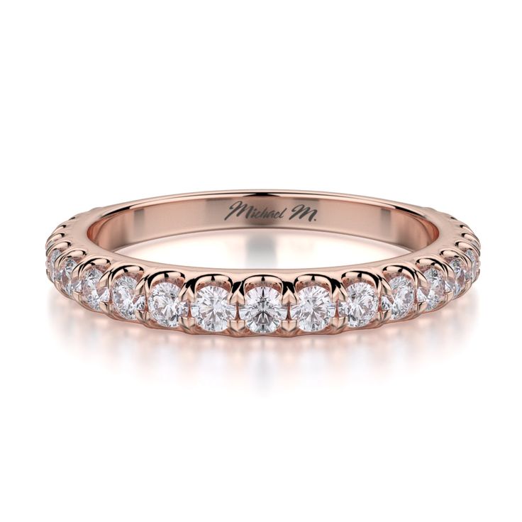 STONE INFORMATION This Michael M ladies wedding band is adorned with brilliant round shaped prong set diamonds, and are placed in a beautiful 3/4 way ring style. For any questions about this wedding band or other Michael M fine jewelry items, consult your local authorized Michael M retailer for more information. METAL INFORMATION Crafted by the jewelry masters of Michael M, this wedding band is made using exquisite 18-karat white gold, breathtaking with a peerless gleam and glow. Long-lasting an Diamond Skull, Diamond Girl, Wedding Band Designs, Half Eternity Wedding Band, Diamond Supply Co, Set Ring, Eternity Wedding Band, Womens Wedding Bands, Brilliant Diamond