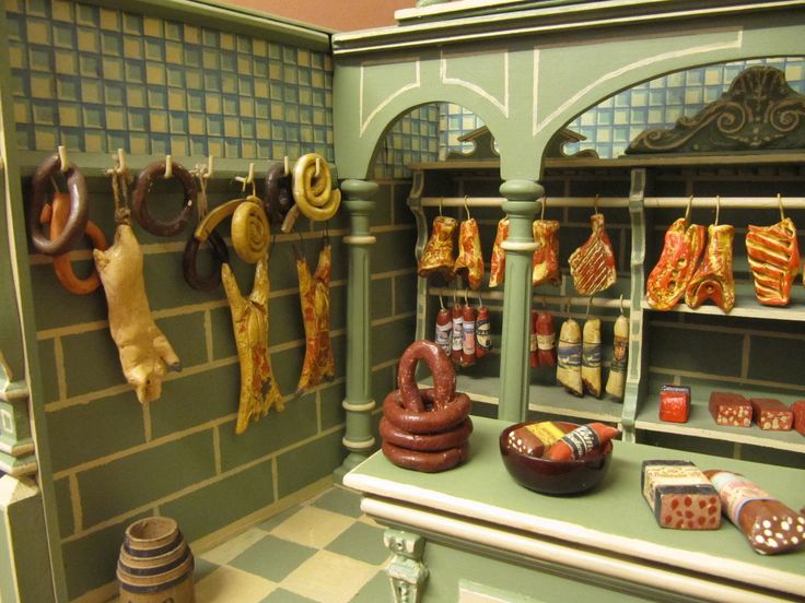 an old fashioned kitchen with various items on display