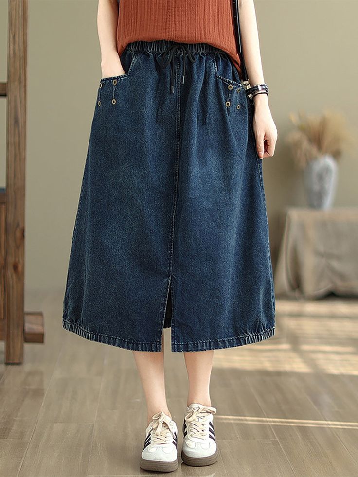 Elevate your summer look with our Women Summer Casual Denim Skirt KL1036. Designed for comfort and versatility, this skirt features a relaxed fit that effortlessly pairs with any top. Step out in style and show off your impeccable taste with this must-have addition to your wardrobe. Item Code: 7461174444094 Material: Denim Pattern: Solid Season: Spring,Summer Washing Recommendations: At 40 or 60 degrees . Wash it with the colored laundry, add a colored detergent. Hand wash or machine wash. Casual Denim Skirt, Linen Harem Pants, Fur Sliders, Women Summer Casual, Striped Linen Shirt, Denim Pattern, 60 Degrees, Denim Patterns, Loose Shirts