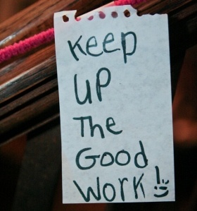 a sign that says keep up the good work