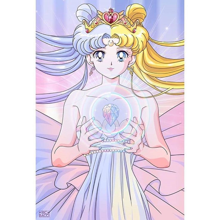 sailor moon holding a crystal ball in her hands