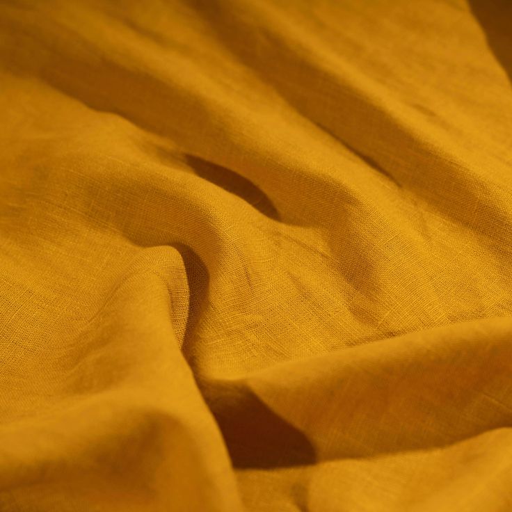 a close up view of a yellow cloth