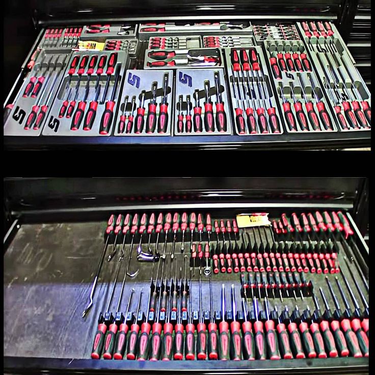 two black trays filled with different types of tools