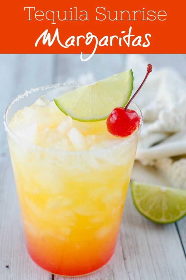 the tequila sunrise margarita is served in a tall glass with a cherry and lime garnish