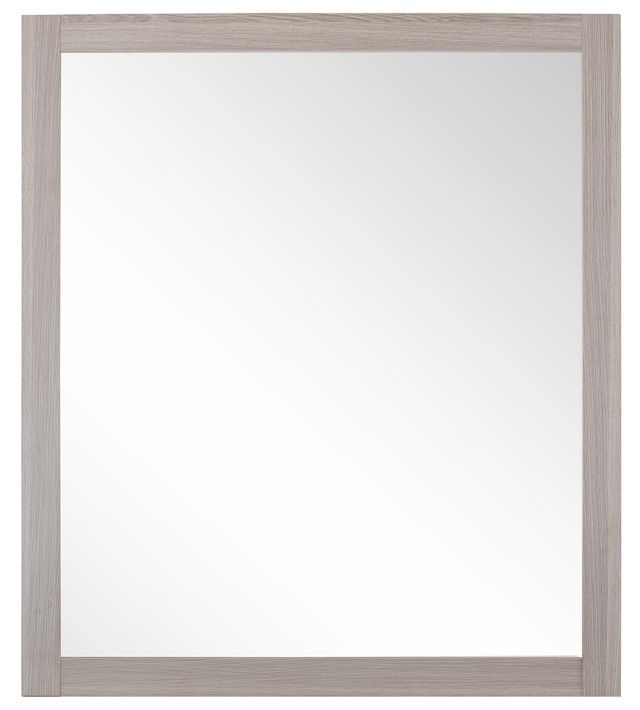 a white framed mirror sitting on top of a wall