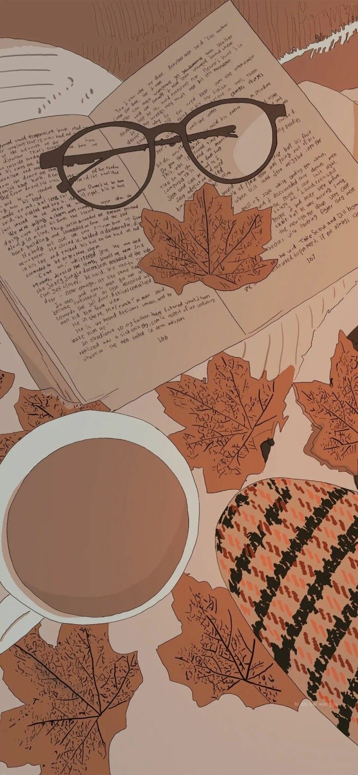 an open book with glasses on top of it next to a cup of coffee and autumn leaves