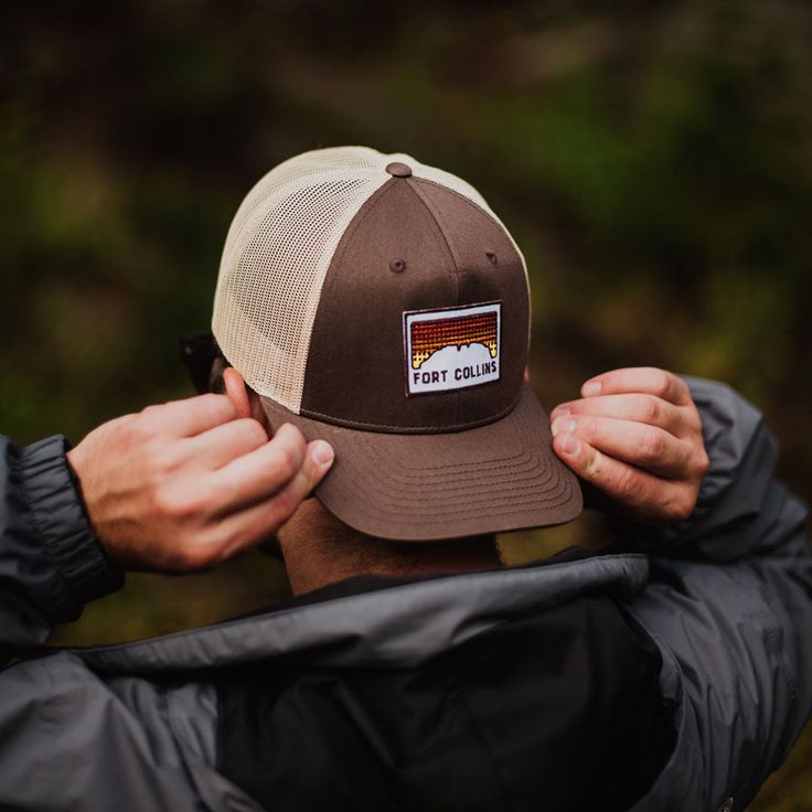 Rock your favorite evening view of the sun setting behind Horsetooth Rock on our new Fort Collins sunset baseball hat. Curved bill baseball cap with a mesh back and embroidered patch on front. Available in light yellow, grey/mustard, & brown. Summer Store, Loden Green, Evening View, Adventure Accessories, Pins Earrings, Old Town Square, Sun Setting, Dad Caps, Fort Collins