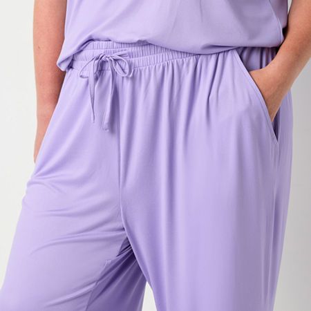 Elevate your sleepwear from the bottom with this pair of Ambrielle women's pajama pants. Made from soft stretch-jersey with lace trims, they have an elastic-drawstring waistband and side slip pockets. Team it with a camisole or pajama top. Features: Lace TrimClosure Type: Drawstring, Full ElasticPockets: 2 Side Slip PocketsApparel Length: 33 InchesFiber Content: 95% Polyester, 5% SpandexFabric Description: JerseyInseam: 21 InCare: Tumble Dry, Machine WashCountry of Origin: Imported Long Pants Sleepwear With Elastic Waistband, Stretch Sleepwear With Elastic Waistband For Bedtime, Elastic Stretch Sleepwear With Waistband For Bedtime, Elastic Stretch Sleepwear For Bedtime, Elastic Stretch Sleepwear With Waistband, Relaxed Fit Pants With Elastic Waistband For Bedtime, Elastic Waistband Sleepwear For Lounging, Solid Sleepwear With Elastic Waistband And Relaxed Fit, Wide Leg Sleepwear With Elastic Waistband For Sleepover