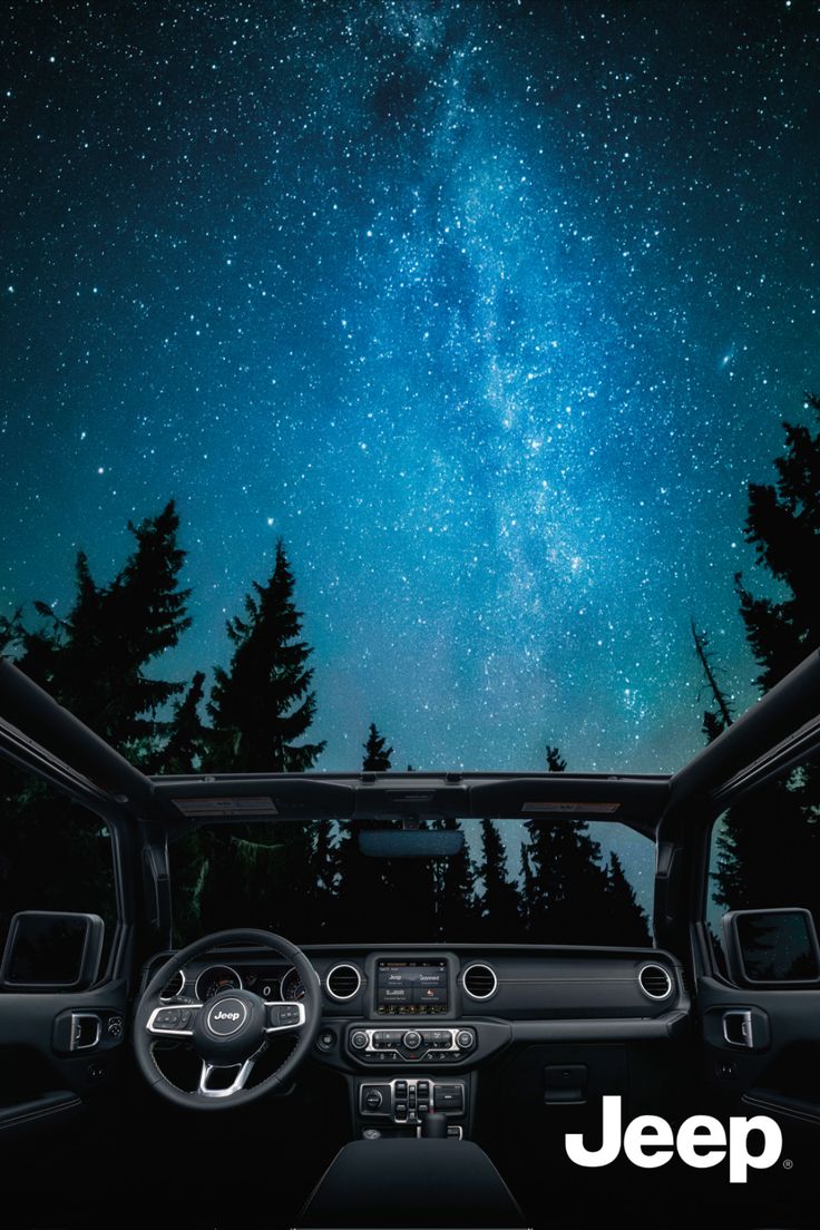 the interior of a jeep with trees and stars in the sky behind it, as well as text that reads jeep