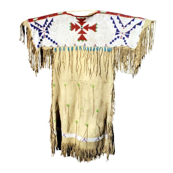 an old native american blanket with fringes on it's shoulders and neckline