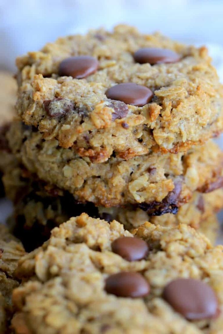 chocolate chip oatmeal cookies stacked on top of each other