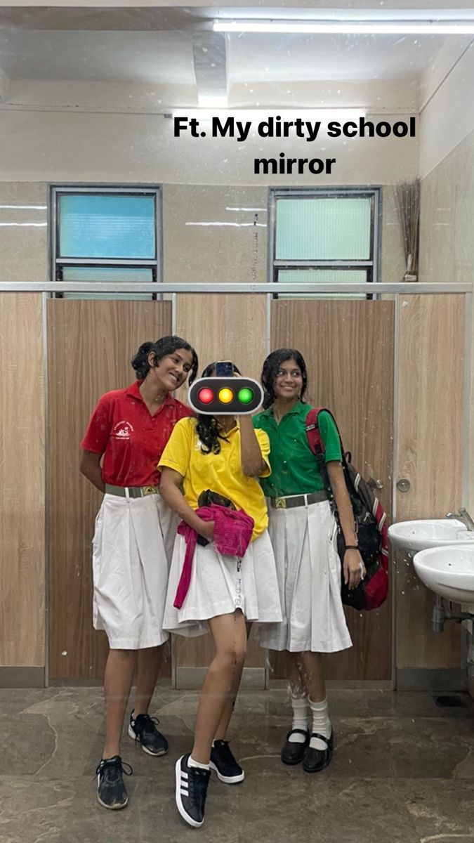 three women standing next to each other in front of a bathroom stall with the words f t my dirty school mirror