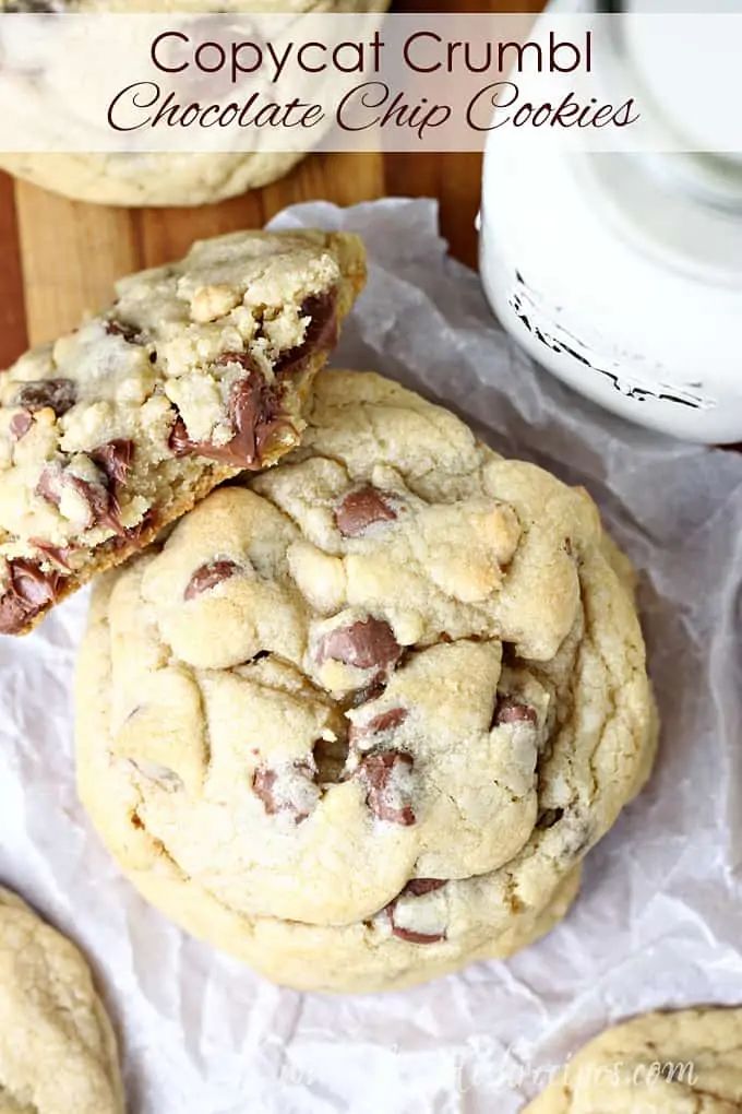 two chocolate chip cookies are stacked on top of each other