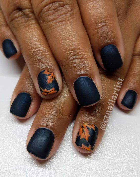 Navy blue nails Looking for stylish and easy to wear nail art? If so, this could be perfect for you. Gorgeous matte orange fall leaves... Brown And Navy Nails, Navy And Orange Nails Design, Blue Autumn Nail Designs, Navy Nails Fall, Navy Autumn Nails, Navy Blue Matte Nails Fall, Blue September Nails, Navy Blue Autumn Nails, Burnt Orange And Navy Nails