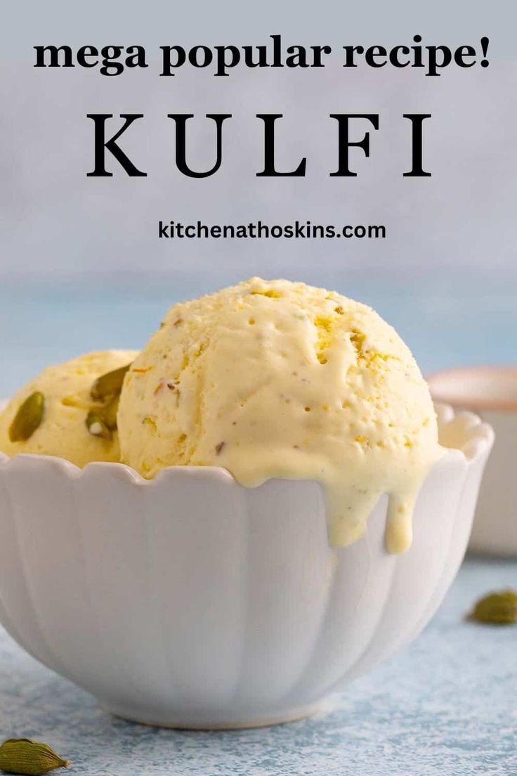 a white bowl filled with ice cream and topped with pistachio