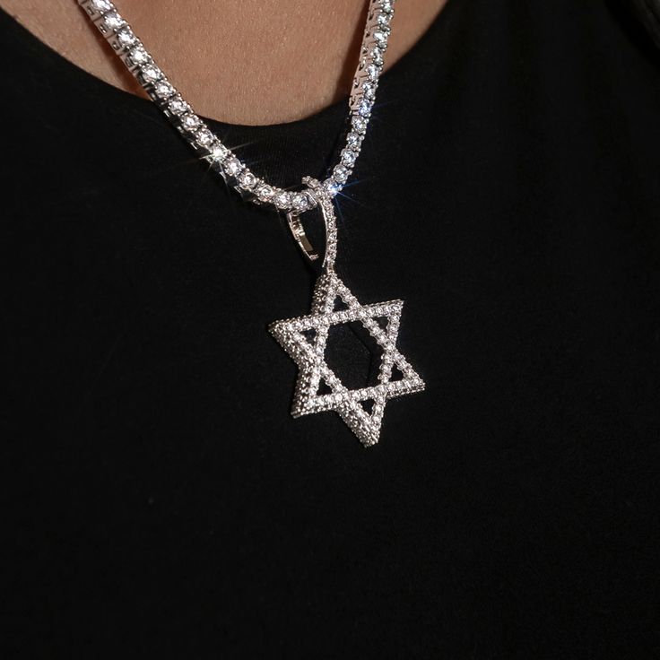 Introducing the Diamond Pave Star of David Pendant- a symbol of protection, unity, and connection. Crafted with detail and care, this pendant shines with hand-set baguette stones, honoring the Jewish religion. Whether worn as a statement piece or as a daily reminder of faith and tradition, this pendant seamlessly blends style with spirituality. Pair it with a Diamond Tennis Necklace for a set that will shine! This product is guaranteed for life - GLD will repair the item should you experience an Diamond White Star Of David Jewelry Gift, Luxury White Gold Star Of David Jewelry, Silver Diamond Jewelry With Star Charm, Luxury Silver Star Of David Jewelry, Silver Cubic Zirconia Star Of David Jewelry, Luxury Sterling Silver Star Of David Jewelry, White Gold Cubic Zirconia Star Of David Jewelry, Silver Star Of David Necklace Tarnish Resistant, Fine Jewelry Star Of David Cubic Zirconia