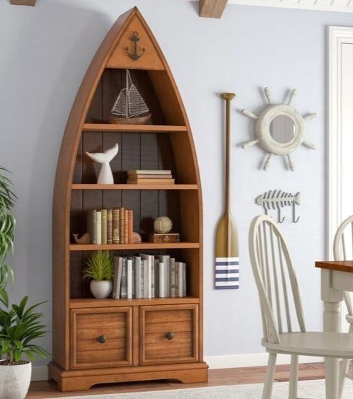 a living room filled with furniture and a book shelf next to a dining room table