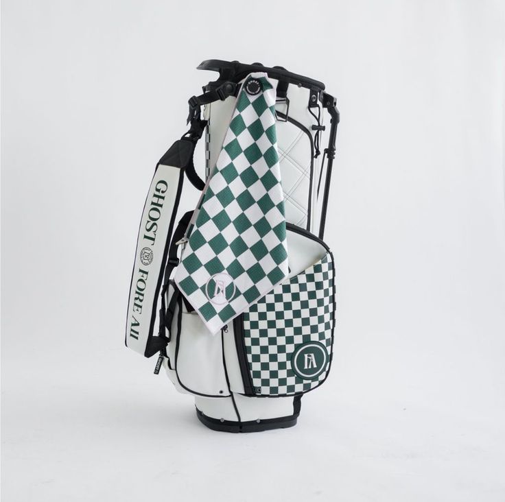 a golf bag with a checkered tie on it